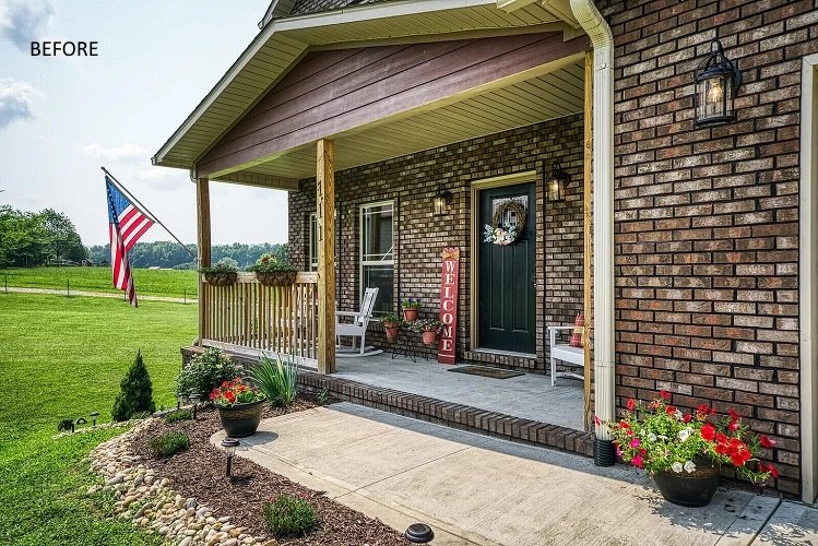 Brick house front porch with brown faded columns and trim before painting